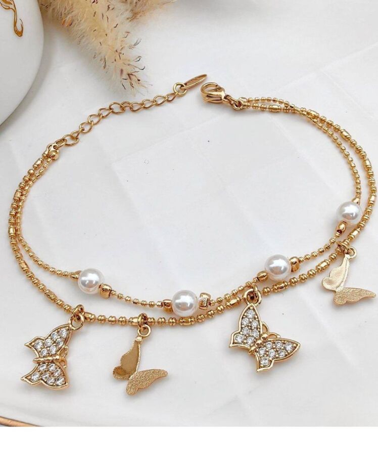 دستبندزنانه طلایی دو زنجیر طرح ترکیبی پروانه بانگین های سواروسکی و مروارید پرورشی ژوپینگ در نوروژ اکسسوری